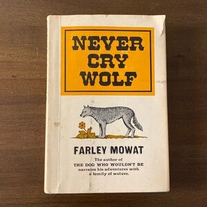 Never Cry Wolf by Farley Mowat (hardcover)